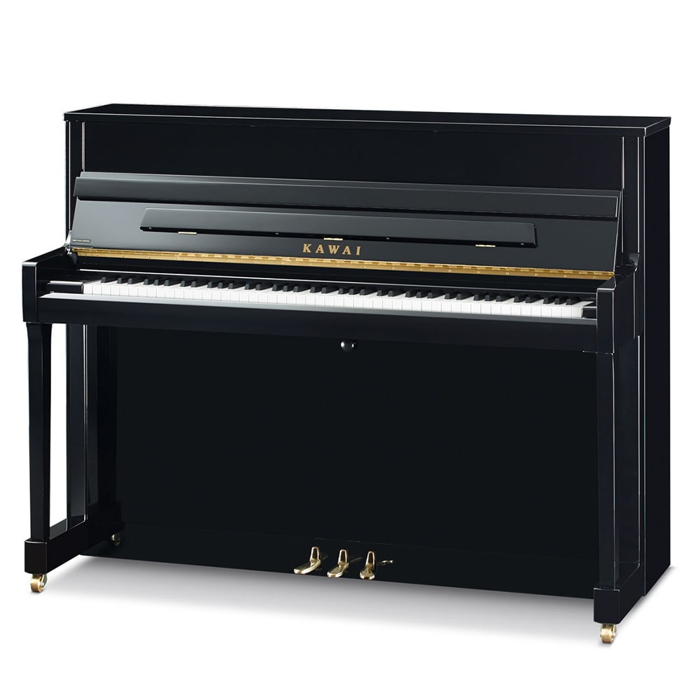 Upright black piano.